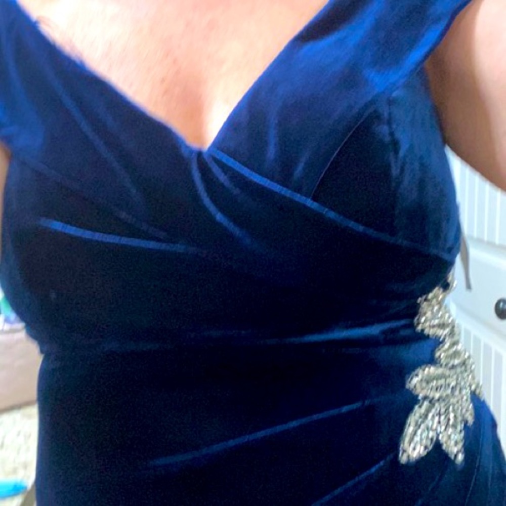 Navy velvet evening gown with adornments